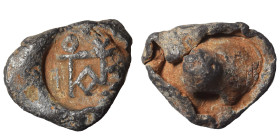 Roman or Byzantine lead seal, circa 5-6th century (lead, 5.32 g, 18 mm). Monogram. Rev. Blank. Nearly very fine.