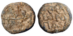 Byzantine lead seal, uncertain (lead, 13.99 g, 20 mm). Monogram. Rev. Inscription in three lines. Fine.