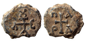Byzantine lead seal, uncertain (lead, 8.09 g, 20 mm). Monogram. Rev. Cross with letter in each angle. Nearly very fine.