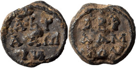 Byzantine lead seal, uncertain (lead, 5.74 g, 16 mm). Inscription in three lines. Rev. Inscription in three lines. Nearly very fine.