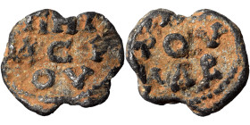 Byzantine lead seal, uncertain (lead, 4.77 g, 19 mm). Inscription in two lines. Rev. Inscription in three lines. Nearly very fine.