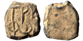 Byzantine lead seal, uncertain (lead, 8.25 g, 22x20 mm). Inscription in two lines. Rev. Blank. Nearly very fine.