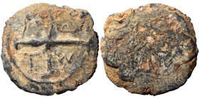 Byzantine or Crusaders lead seal, uncertain, circa 11-12th century (lead, 28.48 g, 36 mm). Cross, [..-..] / T-W. Rev. Blank. Fine.