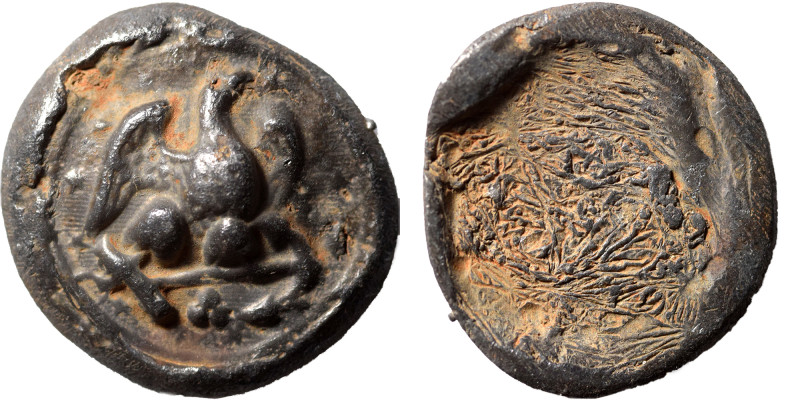 Uncertain lead seal or tesserae. (lead, 13.80 g, 26 mm).Eagle standing right, wi...