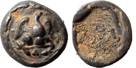 Uncertain lead seal or tesserae. (lead, 13.80 g, 26 mm).Eagle standing right, with wings displayed. Rev. Blank. Very fine.
