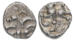 Central Europe, Vindelici. AR Quinarius, 1.91 g 12.86 mm. 1st century BC. "Büschelquinar" type.
Obv: Whirl of six sickles; two pellets in centre.
Rev:...