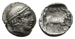 Thrace, Ainos. AR Diobol, 1.19 g 12.58 mm. Circa 408-406 BC.
Obv: Head of Hermes right wearing petasos.
Rev: AINI,Goat standing right; crab below rais...