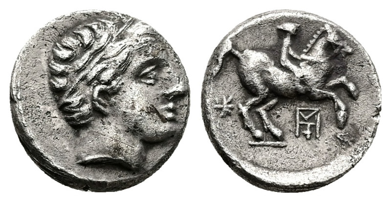 Kings of Macedon, Philip II, 1/5 AR Tetradrachm, 2.40 g 13.81 mm. 359-336 BC. 
O...