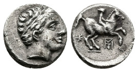 Kings of Macedon, Philip II, 1/5 AR Tetradrachm, 2.40 g 13.81 mm. 359-336 BC. 
Obv: Diademed head of Apollo to right. 
Rev: [ΦIΛIΠΠOΥ], Youth on horse...