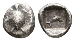 Islands off Attica, Aegina, AR Obol, 0.90 g 9.73 mm. Circa 480 BC. 
Obv: Turtle with smooth shell, ridge down middle 
Rev: Dolphin swimming right with...