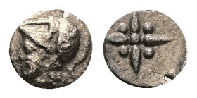 Asia Minor. Uncertain mint. AR, Hemiobol, 0.21 g 6.92 mm. Circa 500-400 BC.
Obv: Helmeted head of Athena left.
Rev: Star of four rays, pellets between...