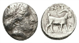 Troas, Antandros. AR Diobol, 1.37 g 6.30 mm. 5th century BC. 
Obv: Head of Artemis Astyrene right; hair bound.
Rev: ANTA / N. Goat standing right with...