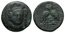 Troas, Sigeion. Ae. 8.33 g 20.69 mm. 4th-3rd centuries BC.
Obv: Helmeted head of Athena facing slightly right.
Rev: ΣΙΓΕ, Double-bodied owl standing f...