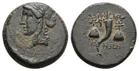 Mysia, Adramytion. Ae, 6.00 g 21.31 mm. 2nd century BC. 
Obv: Laureate head of Apollo left.
Rev.: ΑΔΡΑΜΥΤΗΝΩΝ; Cornucopia between two pilei of the Dio...