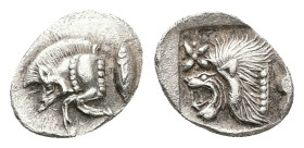 Mysia, Kyzikos. AR Hemiobol, 0.41 g 10.62 mm. Circa 450-400 BC.
Obv: Forepart of boar left; to right, tunny upward.
Rev: Head of roaring lion left; st...