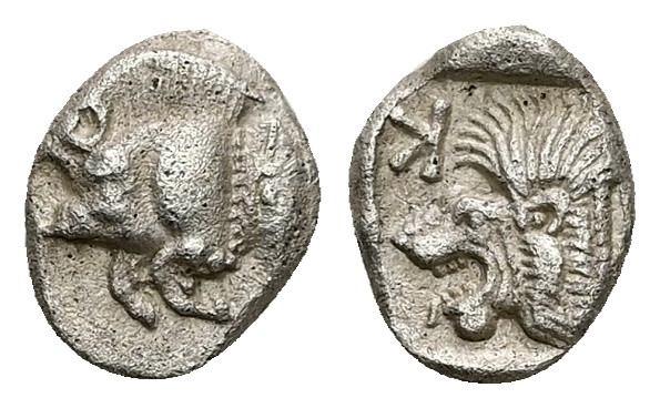 Mysia, Kyzikos. AR Obol, 0.84 g 10.13 mm. Circa 450-400 BC.
Obv: Forepart of boa...