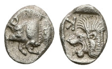 Mysia, Kyzikos. AR Obol, 0.84 g 10.13 mm. Circa 450-400 BC.
Obv: Forepart of boar left; tunny to right.
Rev: Head of roaring lion left; retrograde K i...