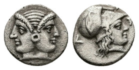 Mysia, Lampsakos. AR Diobol, 1.27 g 11.81 mm. 4th-3rd centuries BC.
Obv: Janiform female head.
Rev: ΛΑΜΨA. Helmeted head of Athena right within incuse...