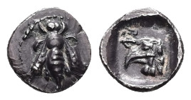 Ionia, Ephesos AR Obol, 0.57 g 9.13 mm. Circa 500-420. 
Obv: Bee 
Rev: Head of eagle to left; EΦ to left; all within incuse square. 
Ref: SNG Kayhan 1...