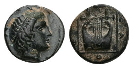Ionia, Kolophon. Ae, 1.51 g 11.14 mm. Circa 389-350 BC.
Obv: Head of Apollo right, wearing tainia.
Rev: KOΛOΦΩ. Lyre with five strings within linear s...