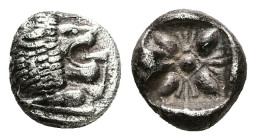 Ionia, Miletos. AR Obol or Hemihekte, 1.13 g 9.90 mm. Late 6th-early 5th century BC.
Obv: Forepart of lion left, head right.
Rev: Stellate floral desi...