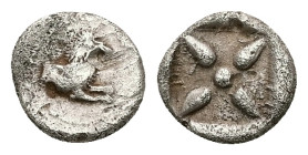 Caria ?. Uncertain. AR Obol, 0.66 g 9.22 mm. Circa 480-450 BC 
Obv: Forepart of lion right.
Rev.: Star of four rays within incuse square. 
Ref.: Unpub...