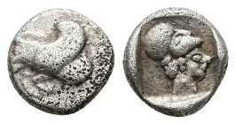 Caria, Ialysos, AR Diobol, 1.41 g 10.21 mm. Circa 480-408 BC. 
Obv: Forepart of winged boar left 
Rev: Helmeted head of Athena right within incuse squ...