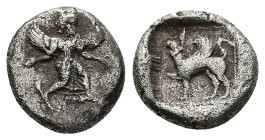 Caria, Kaunos, AR Hemidrachm, 2.79 g 13.86 mm. Circa 490-470 BC.
Obv: Iris, wearing long chiton, winged shoes and winged headdress, and with curved w...