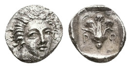 Caria, Rhodes, AR Obol, 0.57 g 8.76 mm. Circa 408-390 BC.
Obv: Radiate head of Helios facing slightly right.
Rev: P - O. Rose.
Ref: Ashton 26-7; HGC 6...