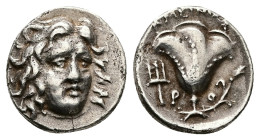 Caria, Rhodes. AR Drachm, 2.78 g 15.10 mm. 229-205 BC. Magistrate: Ameinias. 
Obv: Head of Helios facing slightly right.
Rev.: ΑΜΕΙΝΙΑΣ; Rose with bud...