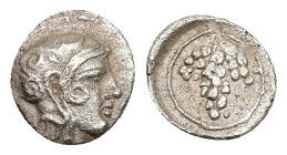 Cilicia, Soloi. AR Tetartemorion, 0.23 g 6.98 mm. Circa 410-375 BC.
Obv: Head of Athena to right, wearing Attic helmet.
Rev: Grape bunch within linear...