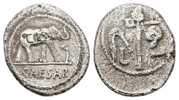 Julius Caesar, 49 BC. AR, Denarius. 3.58 g. 19.53 mm. Rome.
Obv: CAESAR. Elephant advancing right, trampling upon horned serpent.
Rev: Emblems of the ...