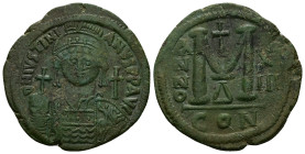 Justinian I, AD 527-565. AE, Follis. 21.90 g. 38.92 mm. Constantinople. Dated RY 13 (539-40).
Obv: DNIVSTINI-ANVS PPAVC. Frontal bust of Justinian I w...