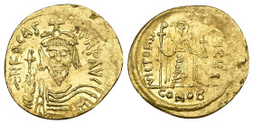 Phocas, AD 602-610. AV, Solidus. 4.44 g. 21.67 mm. Constantinople.
Obv: δNFOCAS-PЄRPAVC. Frontal bust of Phocas bearded, wearing cuirass, paludamentum...