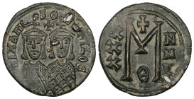 Michael II, Theophilus, AD 820-829. AE, Follis. 8.23 g. 29.86 mm. Constantinople.
Obv: [m]IXAHL-SΘ-EOFILOS. Michael, with crown and chlamys, short bea...