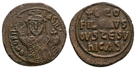 Theophilus, AD 829-842. AE, Follis. 4.14 g. 24.25 mm. Constantinople.
Obv: ΘEOFIL-bASIL. Crowned, three-quarter length figure of Theophilus facing, pe...