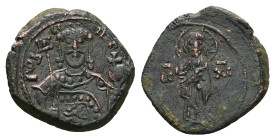 John II Comnenus, AD 1118-1143. AE, Tetarteron. 2.08 g. 17.04 mm. Thessalonica.
Obv: Iω ΔЄCΠT. Crowned bust of John facing, wearing jewelled chlamys, ...