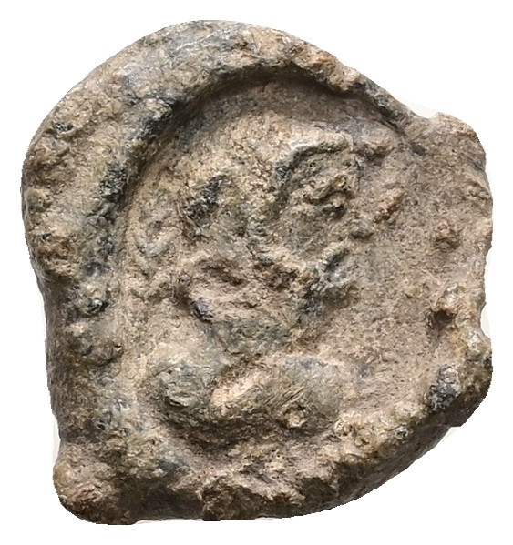 PB Roman provincial. Asia Minor. Lead seal (AD 3rd century).
Obv: Bust of beard...