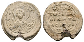 PB Byzantine lead seal of Niketas protasekretis (AD 11th century)
Obv: Half-length of St George holding a spear and shield. Inscription at left and ri...