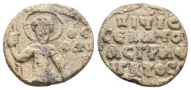 AE Byzantine metrical seal (c. AD 12th century)
Obv: Half-length depiction of St. Theodore holding a spear in his right hand. Inscription: [Ὁ
ἅγιος]...