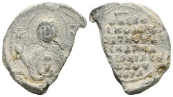 PB Byzantine seal of Nikolaos Zounaras, krites of Thrace and Macedonia (AD 11th century, last
third).
Obv: Bust of the Mother of God holding a medal...