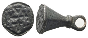 AE Byzantine bronze stamp seal (AD 8th–11th centuries)
Bronz estamp seal of conical form, a large suspension loop above horizontal ridge. Traces of le...