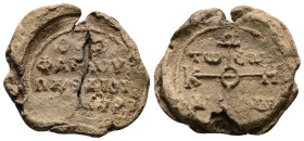 PB Byzantine seal of Theophanes hypatos, dioiketes of Herakleia (AD 9th century).
Obv: Cruciform invocative monogram (type V): Θεοτόκε βοήθει. In the...