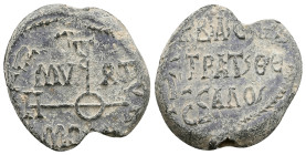 PB Byzantine seal of N., imperial protospatharios and strategos of Thessalonica (AD 9th
century).
Obv: Cruciform invocative monogram; n the quarters...