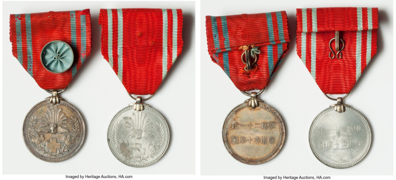 Pair of "WWII Red Cross" Medals ND (1941), One is silver, the other is a base me...