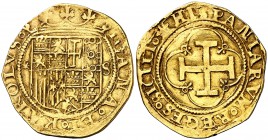 s/d. Juana y Carlos. Sevilla. 1 escudo. (Cal. 58). 3,25 g. Buen ejemplar. MBC+.