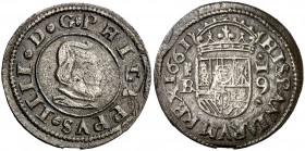 1661. Felipe IV. Segovia. . 16 maravedís. (Cal. 1508). 4 g. Conserva parte del plateado original. Buen ejemplar. Rara. MBC+/EBC-.