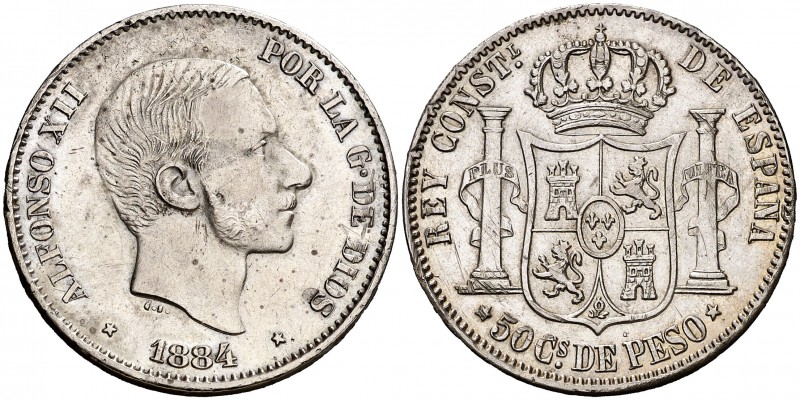 1884. Alfonso XII. Manila. 50 centavos. (Cal. 84). 12,93 g. Leves marquitas. Bue...