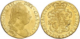 1777. Gran Bretaña. Jorge III. 1 guinea. (Fr. 355) (Kr. 604). 8,28 g. AU. Golpecitos en reverso. Escasa. MBC.