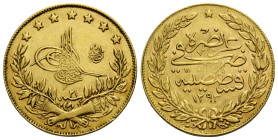 'Abd al-Hamid Khan II, 1293-1327 H./1876-1909 (m. 1918) AD.
 100 Kurush 1293 H / year 21. 22.0 mm. Goldmünze / gold coin 0.917. Tughra neben Blütenzw...